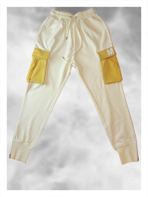 A beautiful cream color track pant with brown pockets